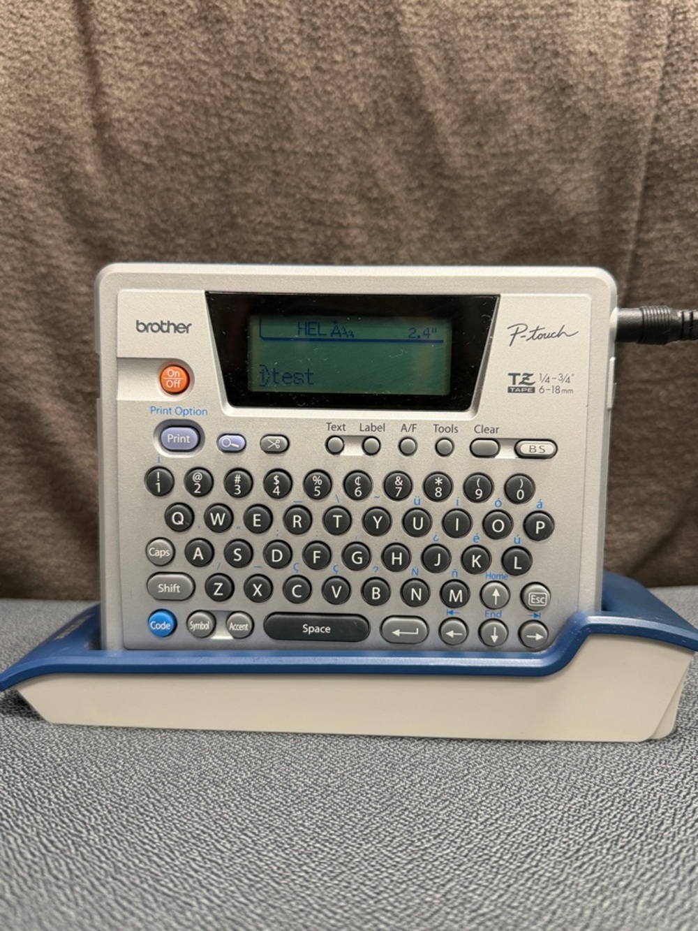Brother P-touch PT-18R Label Maker in Gray and Blue